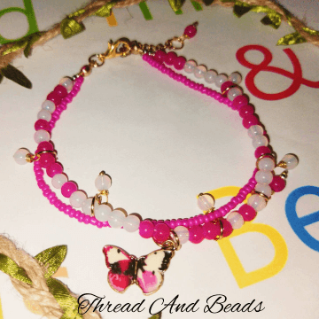 Butterfly Pink & white stone Bracelate