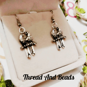 Antique silvr Ird Earing